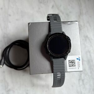 Garmin Gray and Black Fenix 6 Pro Solar Smartwatch with Sleek Design